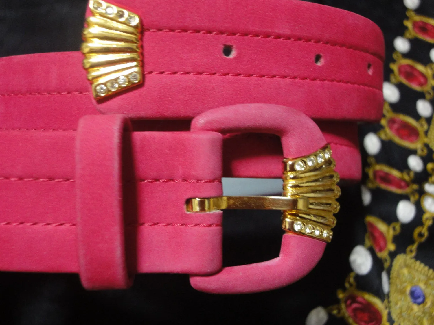 80's Vintage Christian Dior tropical pink suede leather belt with gold motif and crystal stones. Mod and chic belt from Dior.