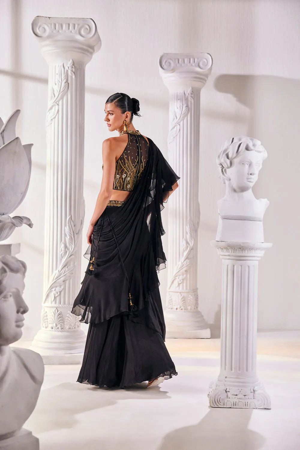 Draped Saree In Chiffon Paired With An Embroidered Organza Blouse And A Belt.