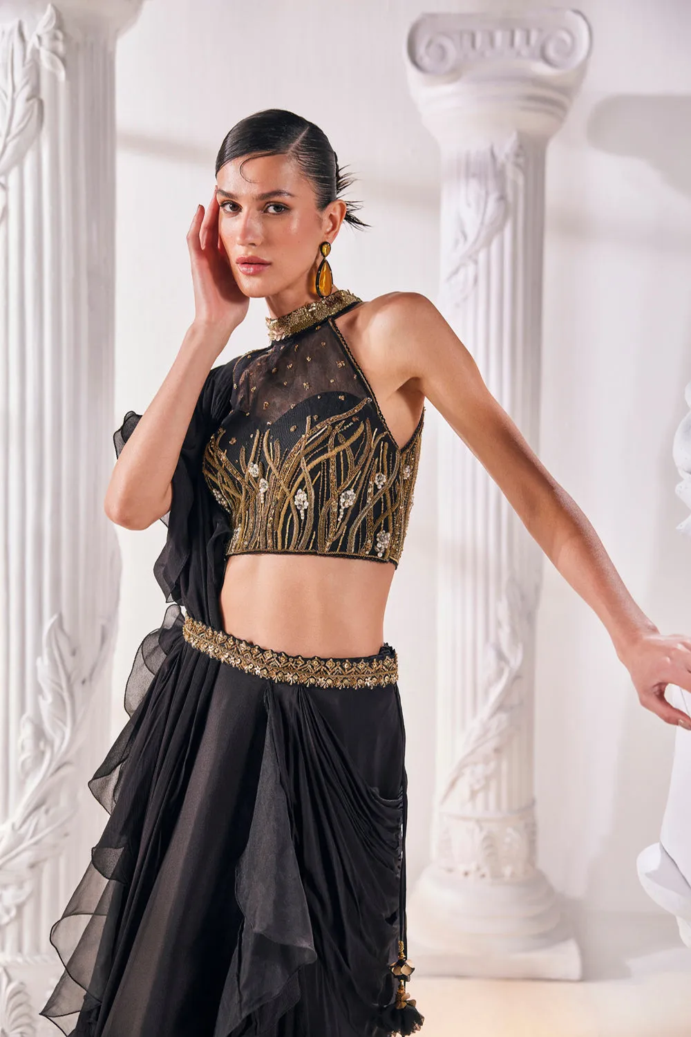 Draped Saree In Chiffon Paired With An Embroidered Organza Blouse And A Belt.